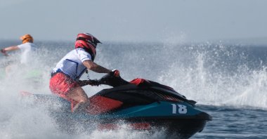 Athletes train with jet skis during the Türkiye Jet Ski, Flyboard and Motosurf Championship, organized by the Turkish Motorcycling Federation (TMF), Gündoğan Public Beach, Bodrum, Muğla, Türkiye, May 13, 2025. (AA Photo)