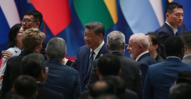Chinese President Xi Jinping (C), Brazilian President Luiz Inacio Lula da Silva (C-R) are surrounded by several other Latin American leaders as they attend the China-CELAC Forum in Beijing, China, May 13, 2025. (EPA Photo)