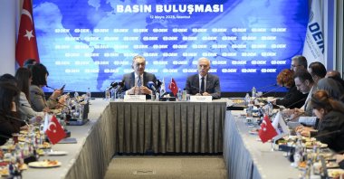 Foreign Economic Relations Board of Türkiye (DEIK) Chair Nail Olpak (R) and Mehmet Ali Yalçındağ, DEIK&#039;s Europe business councils coordinator and chair of the Türkiye-Germany Business Council, at a meeting with media representatives, Istanbul, Türkiye, May 12, 2025. (AA Photo)