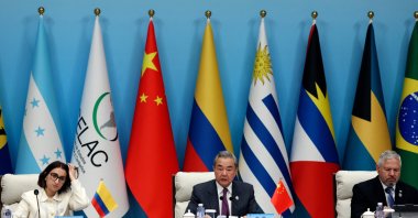 Chinese Foreign Minister Wang Yi (C), Colombian Foreign Minister Laura Sarabia (L) and Honduras Foreign Minister Eduardo Enrique Reina attend the plenary session of the Fourth Ministerial Meeting of the Forum of China and Community of Latin American and Caribbean States (CELAC), Beijing, China, May 13, 2025. (AFP Photo)