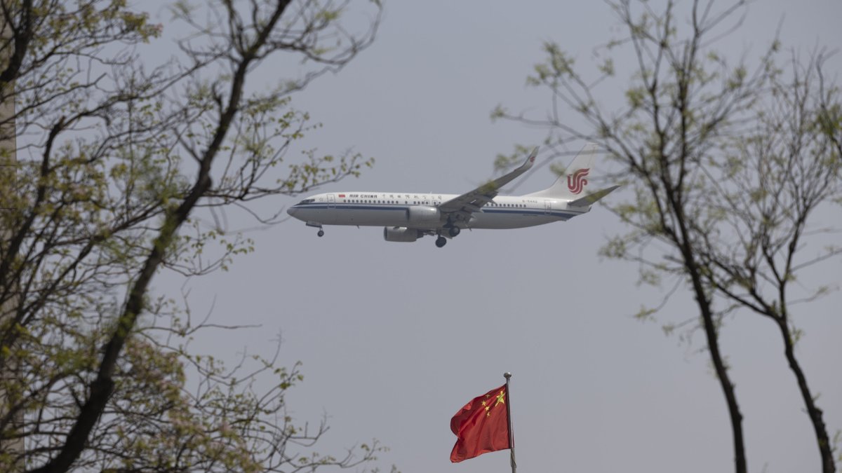 An Air China Boeing airplane approaches Beijing Capital International Airport in Beijing, China, April 16, 2025. (EPA Photo)