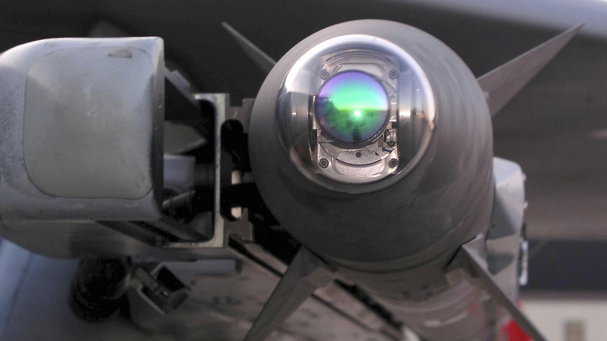 A Raytheon-built AIM-9X Sidewinder infrared-guided air-to-air missile is mounted on one of the 3rd Wing&#039;s F-15C Eagle jets at Elmendorf Air Force Base, Alaska, on Sept. 26, 2003. (AP File Photo)