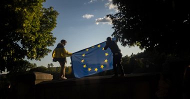 Men hold the EU flag in support of Ukraine on Europe Day, Prague, Czechia, May 9, 2025. (EPA Photo)