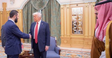 U.S. President Donald Trump and Syria&#039;s interim President Ahmad al-Sharaa shake hands in Riyadh, Saudi Arabia, May 14, 2024. (AA Photo)