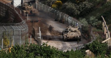 Israeli Merkava tanks pass the cease-fire line, on their way to the buffer zone between Israel and Syria, near the village of Majdal Shams, Israeli-annexed Golan Heights, May 8, 2025. (EPA Photo)