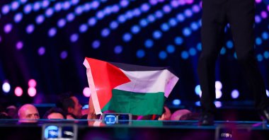 A member of the audience holds a Palestinian flag during the first semifinal of the 2025 Eurovision Song Contest, Basel, Switzerland, May 13, 2025. (Reuters Photo)