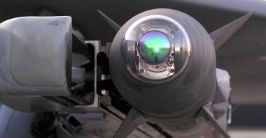 A Raytheon-built AIM-9X Sidewinder infrared-guided air-to-air missile is mounted on one of the 3rd Wing&#039;s F-15C Eagle jets at Elmendorf Air Force Base, Alaska, on Sept. 26, 2003. (AP File Photo)