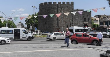 A man walks in the historical Sur district after the announcement of the PKK&#039;s dissolution, Diyarbakır, southeastern Türkiye, May 12, 2025. (AFP Photo)