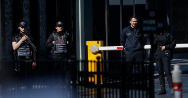 Police officers stand guard, near the Turkish Presidency&#039;s Dolmabahçe working office, where Russia and Ukraine direct talks might happen, in Istanbul, Türkiye, May 15, 2025. (Reuters Photo)
