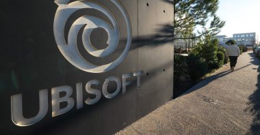 A man passes by the main entrance of the Ubisoft video firm company, Montpellier, France, Feb. 13, 2024. (AFP Photo)