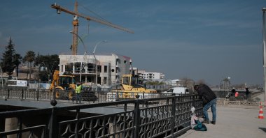 Turkish Housing Development Administration (TOKI) staff work on a bridge in Hatay, southern Türkiye, Feb. 4, 2025. (Reuters Photo)