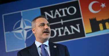 Foreign Minister Hakan Fidan talks to the press as he arrives for the NATO meeting, Antalya, southern Türkiye, May 15, 2025. (AFP Photo)