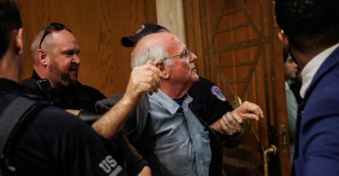 Ben Cohen, co-founder of Ben and Jerry&#039;s, is detained by U.S. Capitol Police for disrupting proceedings during a hearing with U.S. Secretary of Health and Human Services Robert F. Kennedy Jr., Washington, U.S., May 14, 2025. (AFP Photo)