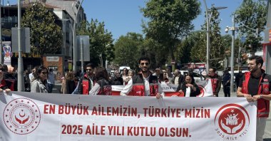 Participants carry banners reading “Happy 2025 Year of the Family to our greatest family, our Türkiye” during a "Family Week" parade, Sakarya, Türkiye, May 15, 2025. (AA Photo)