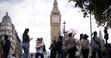 People visit Parliament Square with the Elizabeth Tower, which is commonly known as Big Ben, in the background, in London, U.K., May 12, 2025. (EPA Photo)