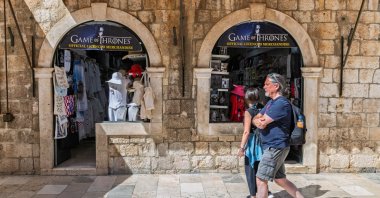 Tourists walk next to the shop with merchandise from the TV series "Game of Thrones," Dubrovnik, Croatia, May 14, 2025. (Reuters Photo)