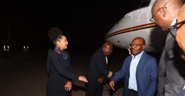 Former Gabon leader Ali Bongo Ondimba (3rd L) walking after getting off a plane at an airport, Luanda, Angola, May 16, 2025. (AFP Photo)