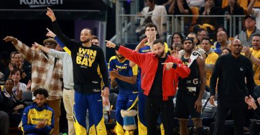Golden State Warriors&#039; Stephen Curry reacts from the bench during the first quarter against the Minnesota Timberwolves in Game Four of the Western Conference Second Round NBA Playoffs at Chase Center, San Francisco, U.S., May 12, 2025. (AFP Photo)