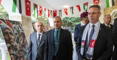Palestinian Ambassador to Ankara Faed Mustafa (R) visits an exhibition commemorating the 77th anniversary of the Nakba at the Palestinian Embassy, Ankara, Türkiye, May 15, 2025. (AA Photo)