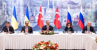 A handout picture made available by Turkish Foreign Minister Press Office shows Turkish Foreign Minister Hakan Fidan (C) attending the meeting of Ukrainian and Russian delegations at the Presidential Office in Istanbul, May 16, 2025. (Foreign Ministry Handout)