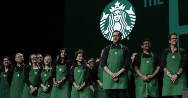 Starbucks baristas stand on stage during an annual shareholders meeting in Seattle, U.S., March 20, 2019. (AP Photo)