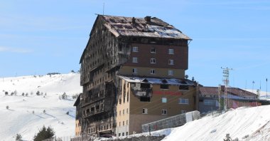 The burned remains of the Grand Kartal Hotel at Kartalkaya Ski Resort following the devastating fire, Bolu, Türkiye, Jan. 29, 2025. (DHA Photo)