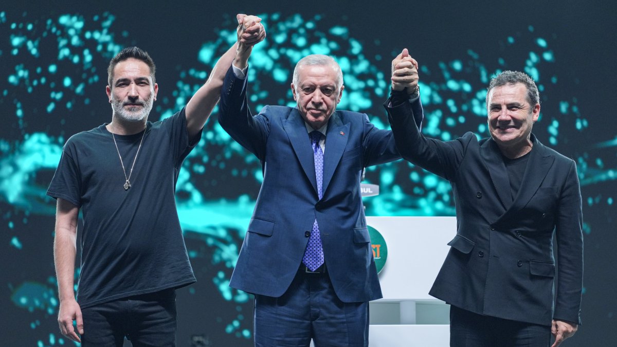 Rapper Sagopa Kajmer (L), President Recep Tayyip Erdoğan (C) and musician Ferhat Göçer greet people during a concert as part of “GENÇFEST: A Youth Festival,” Istanbul, Türkiye, May 18, 2025. (AA Photo)