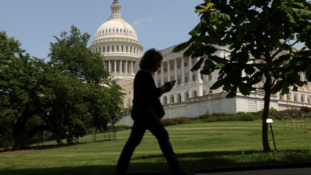 A person walks the grounds of the U.S. Capitol, Washington, U.S., May 16, 2025. (Reuters Photo)