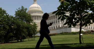 A person walks the grounds of the U.S. Capitol, Washington, U.S., May 16, 2025. (Reuters Photo)