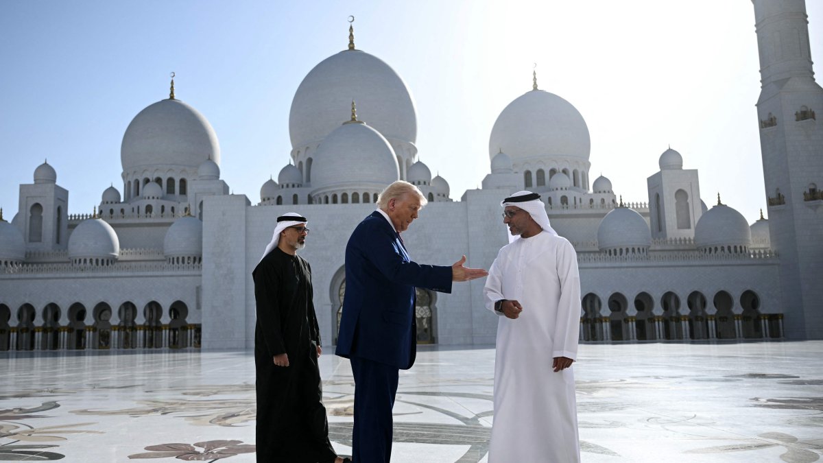 Yousif al-Obaidli, (R) the director-general of the Sheikh Zayed Grand Mosque, accompanies U.S. President Donald Trump on a tour of the mosque in Abu Dhabi, UAE, May 15, 2025. (AFP Photo)