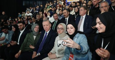 President Recep Tayyip Erdoğan poses for a selfie with guests attending an event, Istanbul, Türkiye, May 16, 2025. (AA Photo)