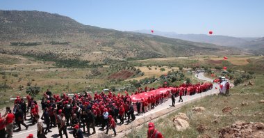 Lawmakers, Parliament Speaker Numan Kurtulmuş and a group of youth attend the march near Gabar Mountain, Şırnak, southeastern Türkiye, May 19, 2025. (AA Photo)