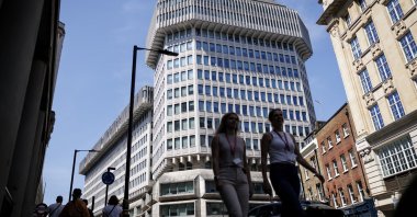 People walk past the Ministry of Justice headquarters, London, U.K., May 14, 2025. (EPA Photo)