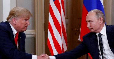 U.S. President Donald Trump and Russia&amp;amp;amp;amp;#039;s President Vladimir Putin shake hands as they meet in Helsinki, Finland July 16, 2018. (Reuters File Photo)