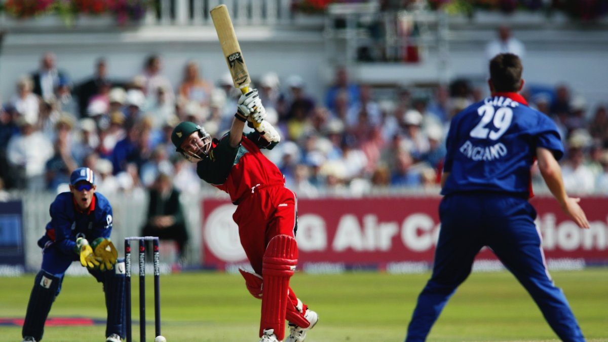 Grant Flower of Zimbabwe hits out during the first match of the NatWest One Day Triangular Series between England and Zimbabwe at Trent Bridge Cricket Ground, Nottingham, U.K., June 26, 2003. (Getty Images Photo)