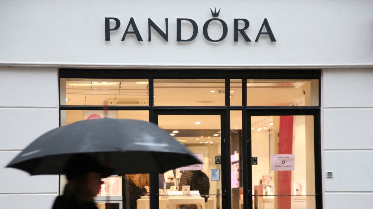 A person passes a shop of the Danish jewellery maker Pandora in central Copenhagen, Denmark, Feb. 6, 2024. (Reuters Photo)