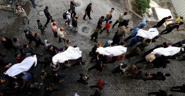 Mourners carry the bodies of Palestinians killed in Israeli strikes during the funeral, in Gaza City, Palestine, May 20, 2025. (Retuers Photo)