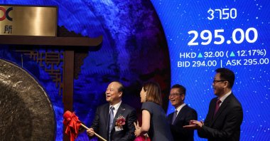 Robin Zeng, founder and chair of battery manufacturer Contemporary Amperex Technology (CATL), and Paul Chan, financial secretary of Hong Kong, attend the company&#039;s listing ceremony at the Hong Kong Stock Exchange, Hong Kong, China, May 20, 2025. (Reuters Photo)