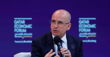 Treasury and Finance Minister Mehmet Şimşek speaks during a session at the Qatar Economic Forum, Doha, Qatar, May 20, 2025. (AFP Photo)