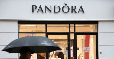 A person passes a shop of the Danish jewellery maker Pandora in central Copenhagen, Denmark, Feb. 6, 2024. (Reuters Photo)