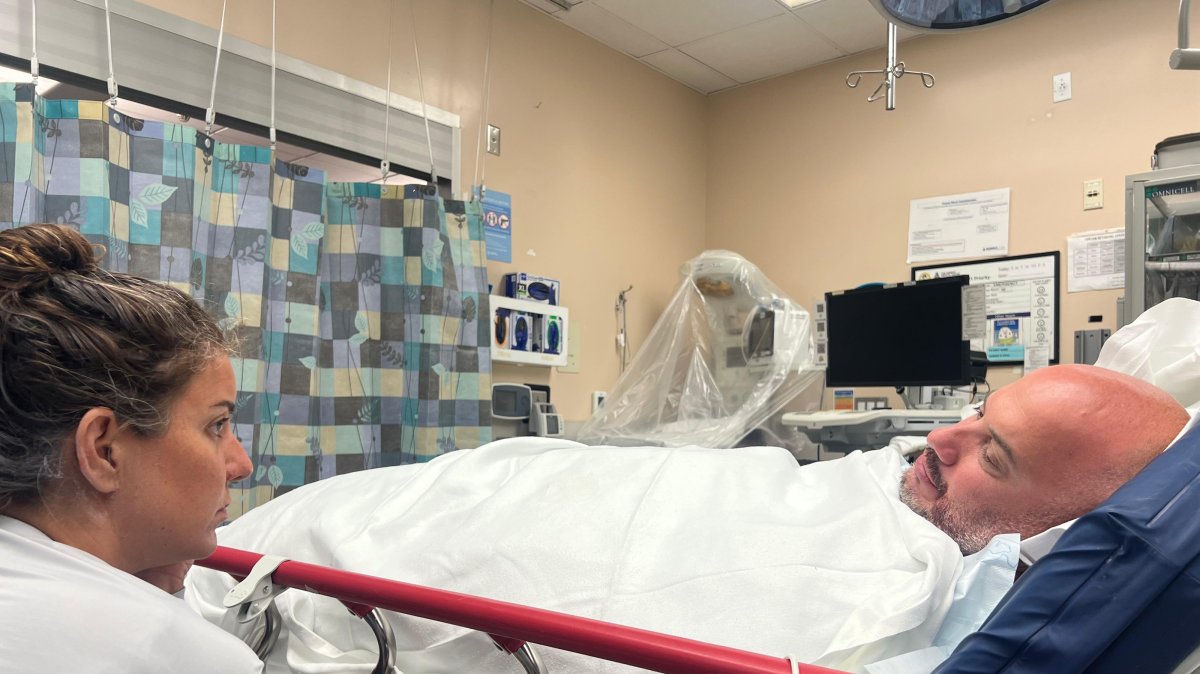 Murat Öz receives medical treatment at the hospital following the shark attack during the Molokai Channel swim, Hawaii, U.S., May 19, 2025. (AA Photo)