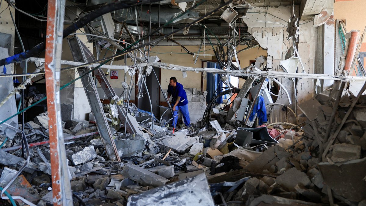 A person inspects Nasser Hospital, a part of which was damaged in an Israeli strike, in Khan Younis, southern Gaza Strip, May 13, 2025. (Reuters Photo)