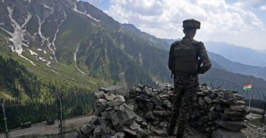 An Indian army soldier stands guard at the Line of Control (LoC) between Pakistan and India, in Indian-administered Kashmir, May 19, 2025. (AFP Photo)