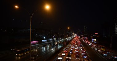Cars are stuck in heavy traffic during evening hours on a major road, Istanbul, Türkiye. (Shutterstock Photo)