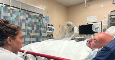 Murat Öz receives medical treatment at the hospital following the shark attack during the Molokai Channel swim, Hawaii, U.S., May 19, 2025. (AA Photo)