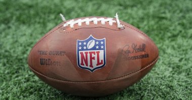 An NFL football with the logo is seen before an NFL football game between the Carolina Panthers and the Dallas Cowboys, Charlotte, U.S., Dec. 24, 2024. (AP Photo)