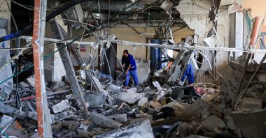 A person inspects Nasser Hospital, a part of which was damaged in an Israeli strike, in Khan Younis, southern Gaza Strip, May 13, 2025. (Reuters Photo)