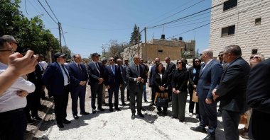 Members of a diplomatic delegation from the European Union gather near the eastern entrance of Jenin camp during a visit to the city of Jenin, May 21, 2025. (AFP Photo)