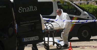 The body of Ukrainian Andrey Portnov, who was an aide to former Ukrainian president Viktor Yanukovich, is removed in the suburb of Pozuelo de Alarcon, Madrid, Spain, 21 May 2025. (EPA Photo)