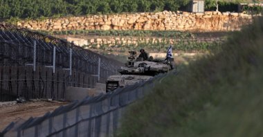 Israeli Merkava tanks roll past the cease-fire line, on their way to the buffer zone between Israel and Syria near the village of Majdal Shams, Israeli-occupied Golan Heights, Syria, May 8, 2025. (EPA Photo)